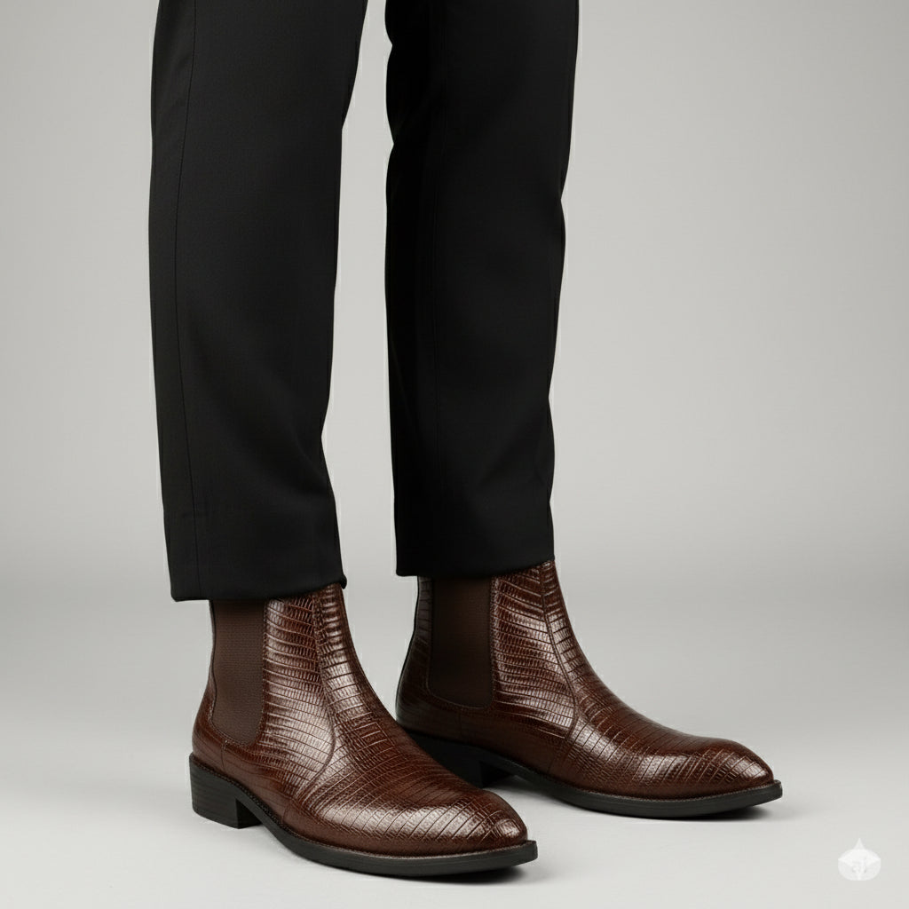 Brown leather boots worn with black pants in a living room setting