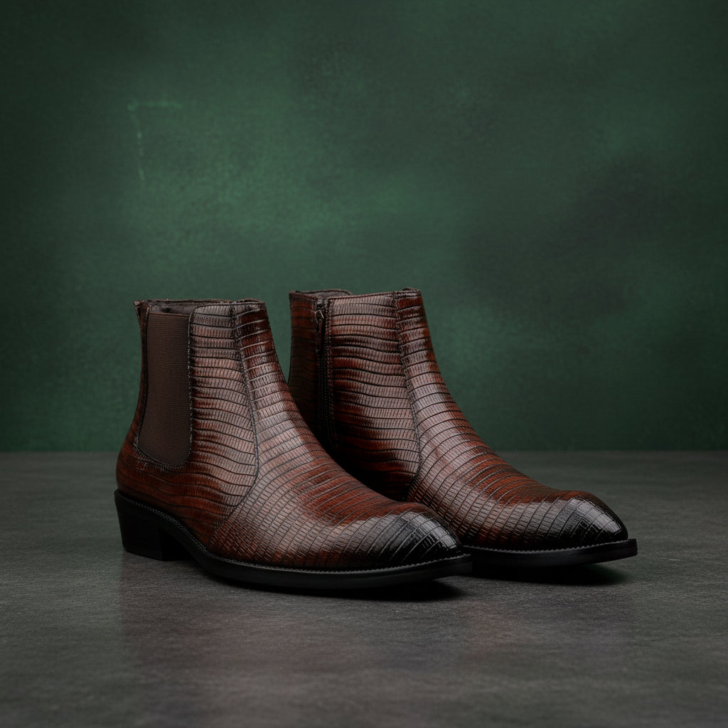 Pair of brown textured ankle boots on a white background