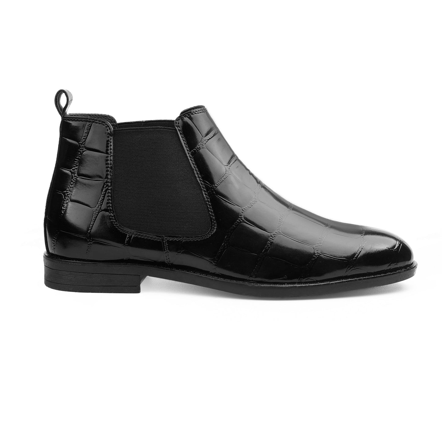 Black patent leather Chelsea boot on a white background