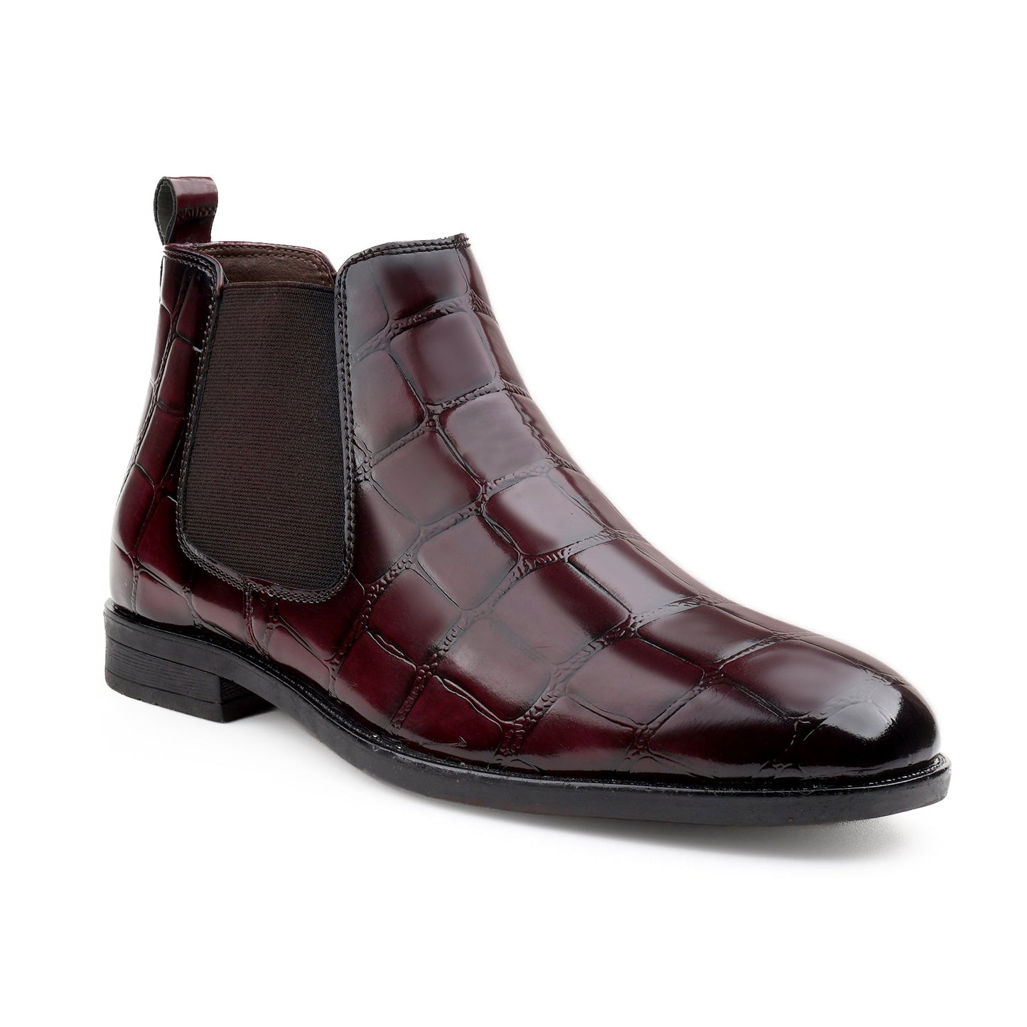 Brown leather Chelsea boot on a white background