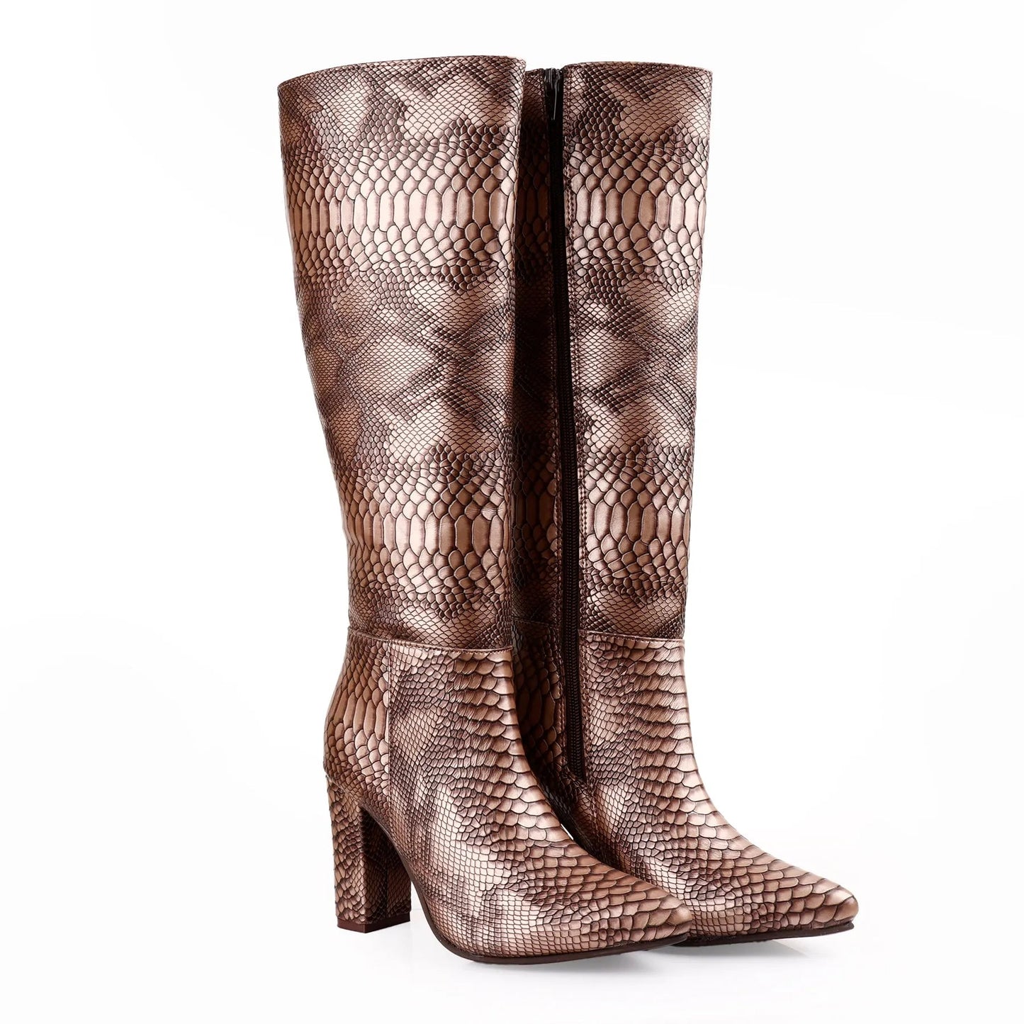 A pair of knee-high boots with a metallic bronze-brown snakeskin pattern, featuring a pointed toe and a block heel, set against a plain white background.