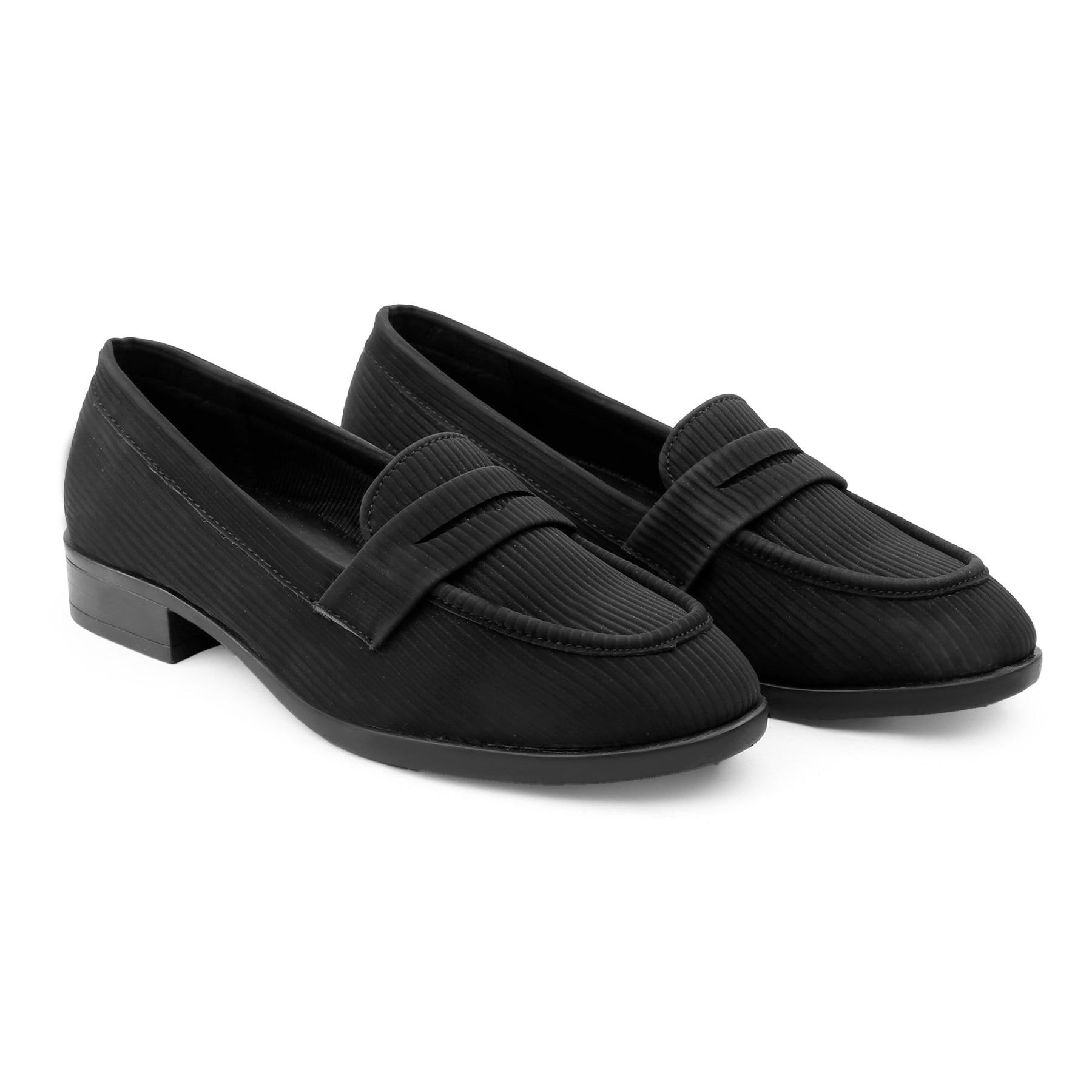 A pair of black penny loafers with a ribbed fabric upper and low block heel, shown on a plain white background.