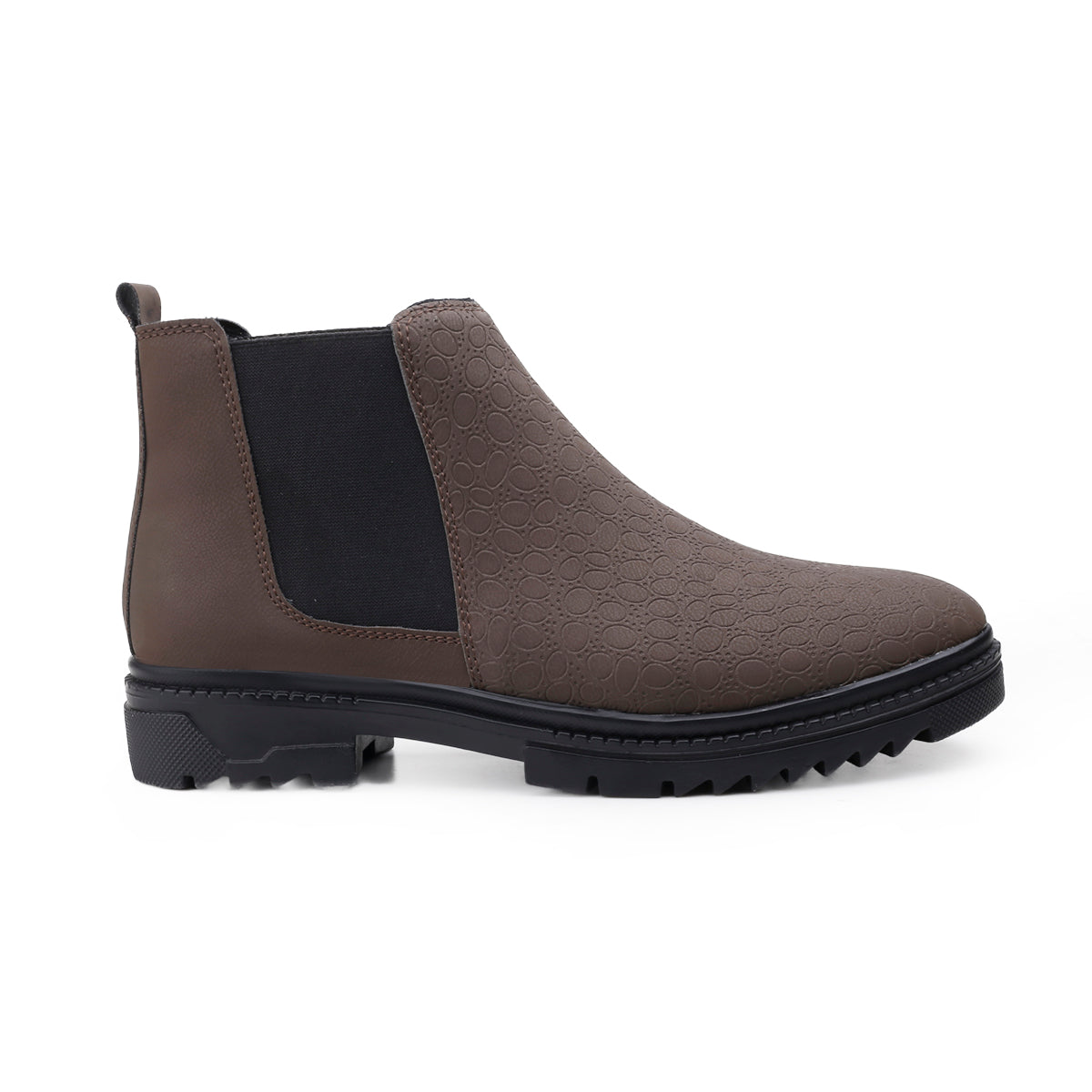 Brown Chelsea boot with black sole on a white background