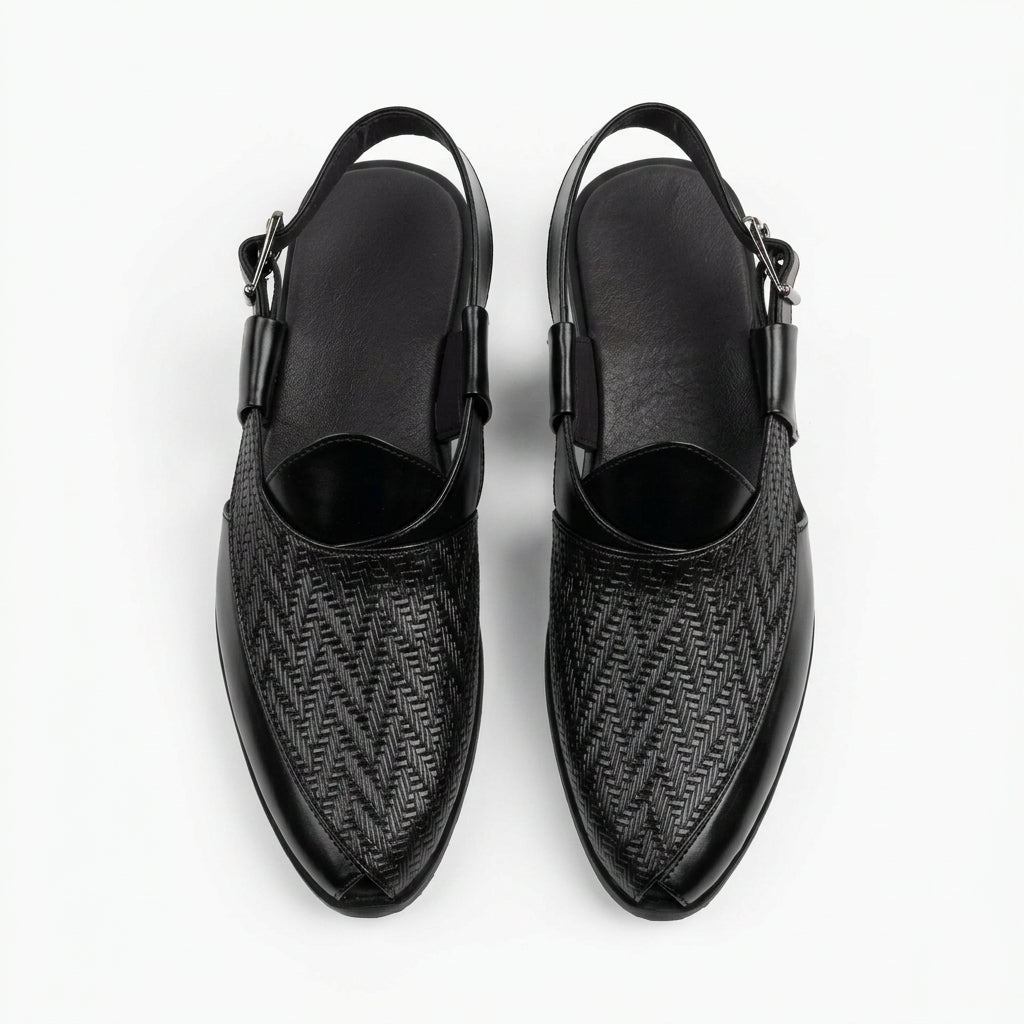 A pair of black slingback Mary Jane-style shoes with a woven herringbone pattern on the sides, displayed on a white faux fur surface next to a black shoebox. The brand name 'AIX' is printed in gold on the insoles.