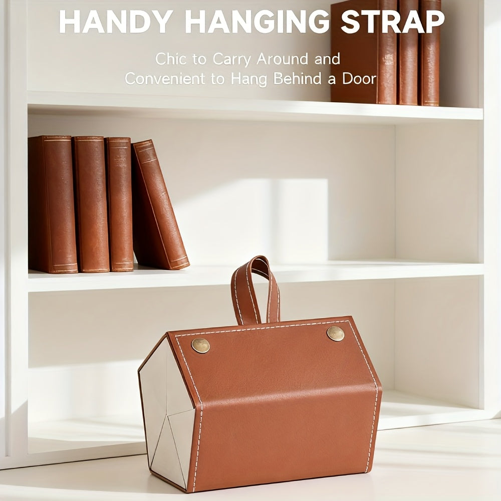 Brown leather bag with a strap on a shelf with books, labeled 'Handy Hanging Strap'.