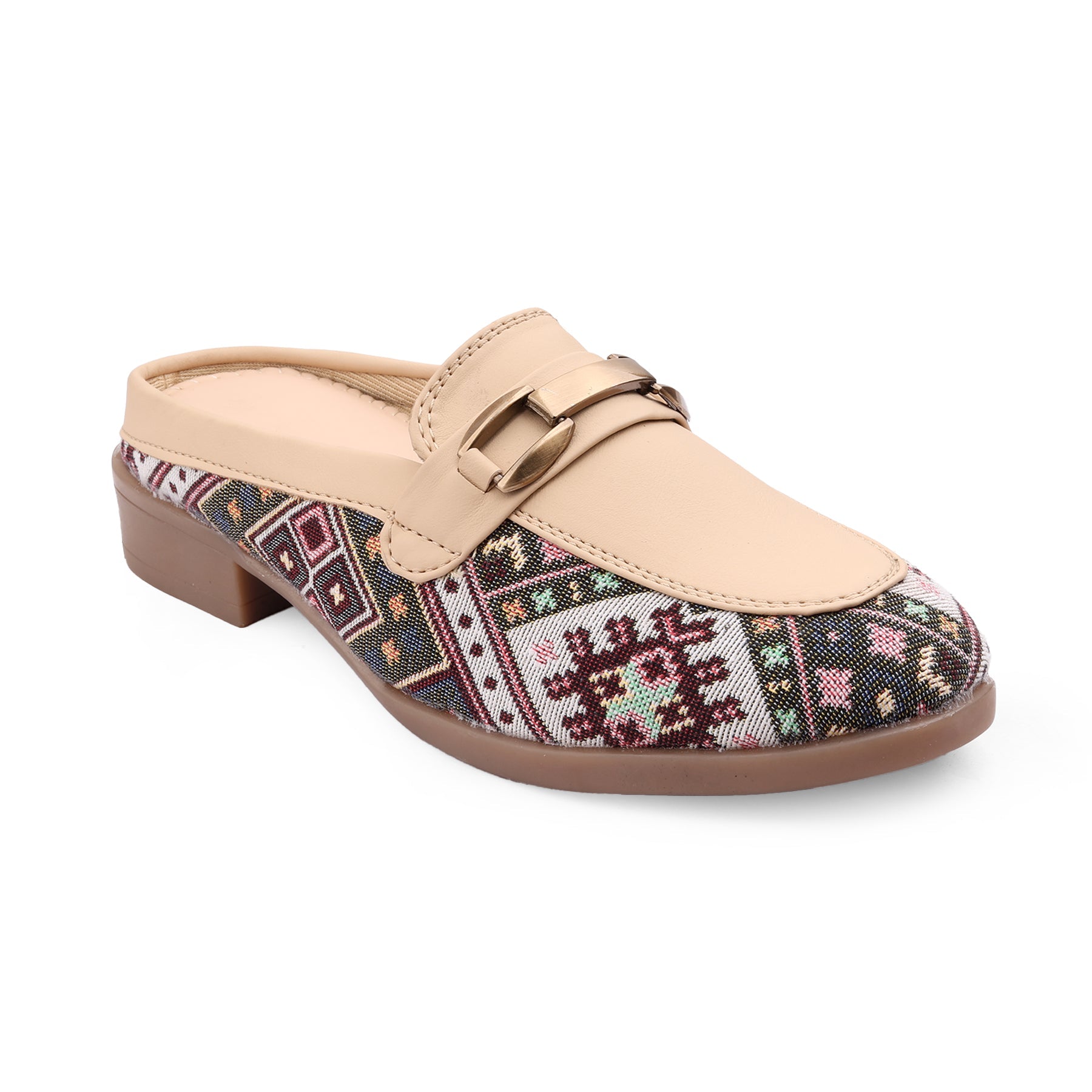 Beige loafer with patterned sole on a white background