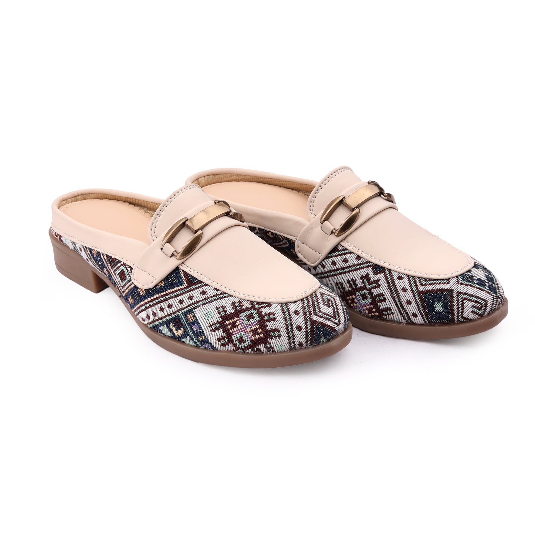 Pair of loafers with patterned sole and beige leather straps on a white background