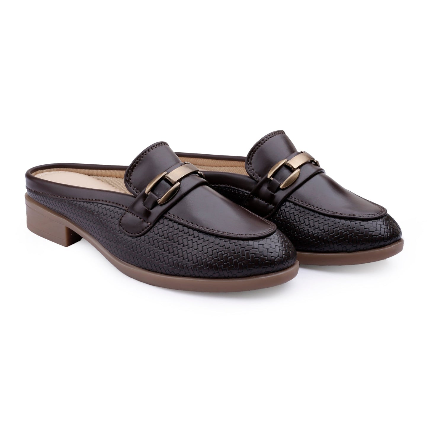 A pair of dark brown leather mule loafers with a textured woven pattern, featuring a low block heel, a strap across the top with a gold-tone buckle, and a brown sole, shown on a white background.