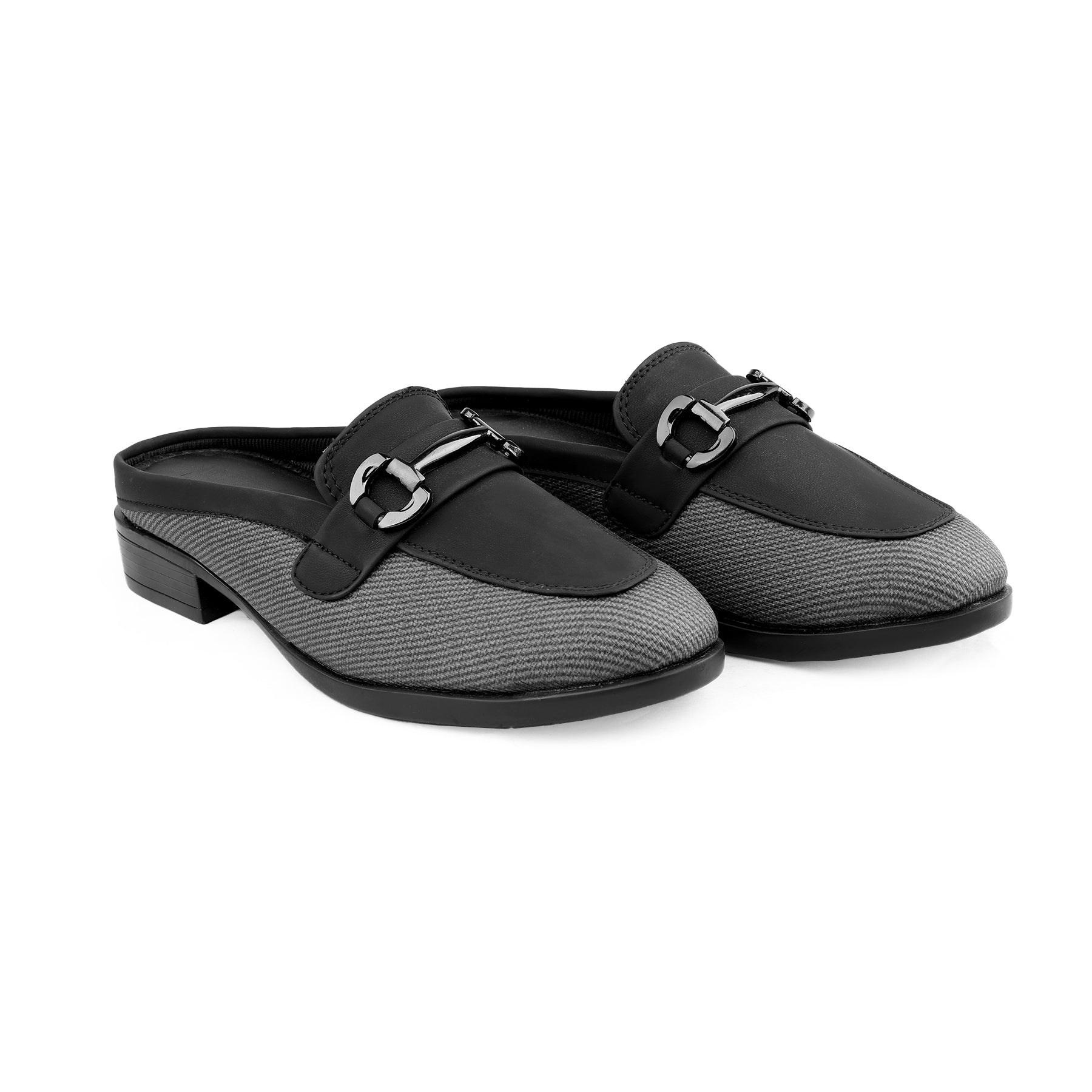 Black and gray slip-on shoes with a buckle on a white background