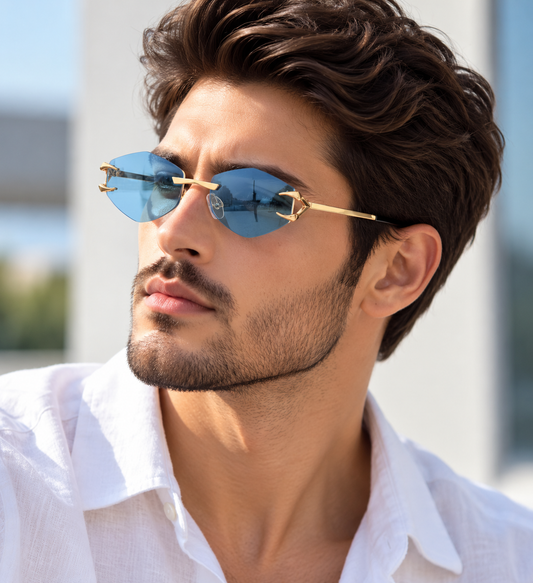 Shop Rocco Bellano rimless sunglasses with brown gradient lenses, gold detailing and a distinctive geometric design. Stylish unisex fashion eyewear.