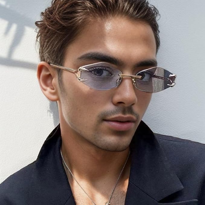 Man wearing stylish sunglasses with a neutral background