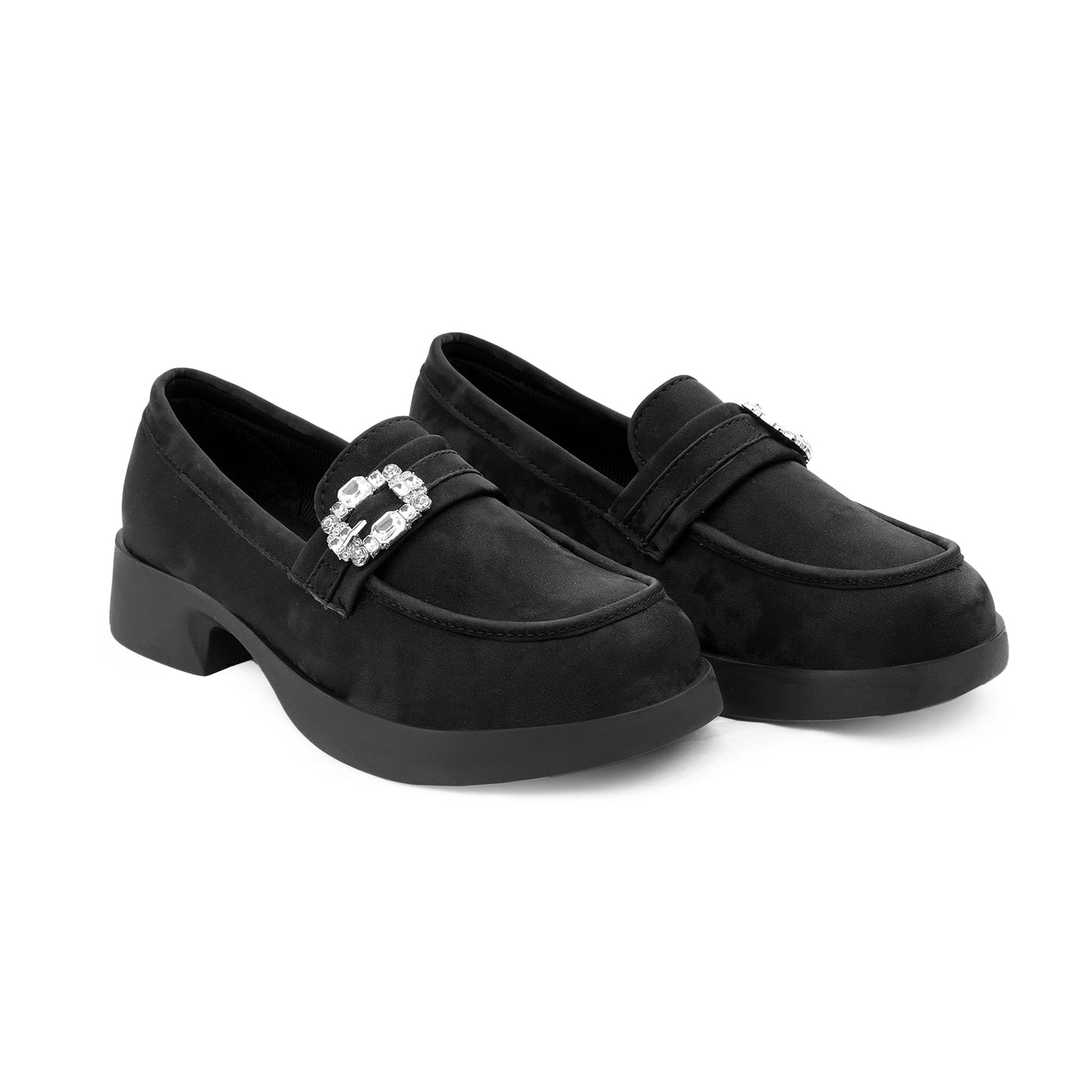 Pair of black dress shoes with decorative elements on a white background