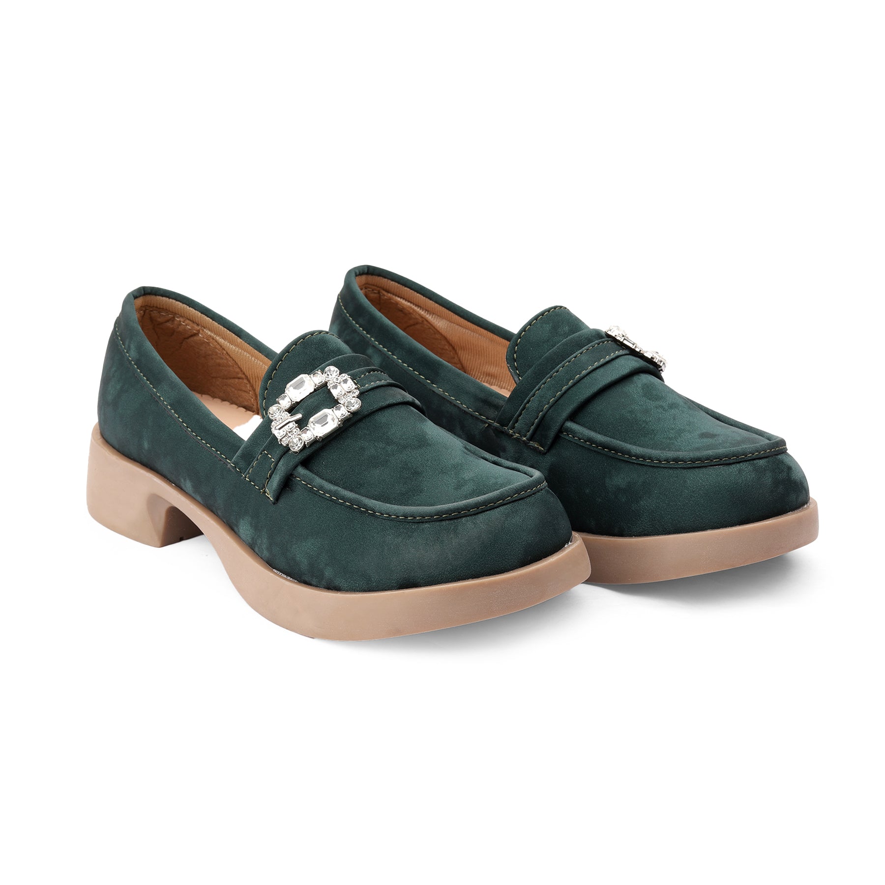 Pair of green loafers with a decorative buckle on a white background