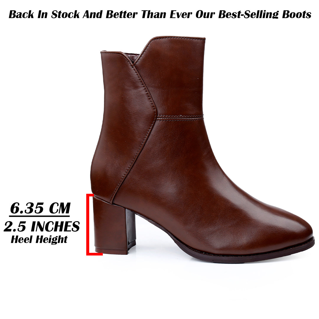A brown leather ankle boot with a block heel, shown in profile on a white background with text overlays indicating heel height measurements.
